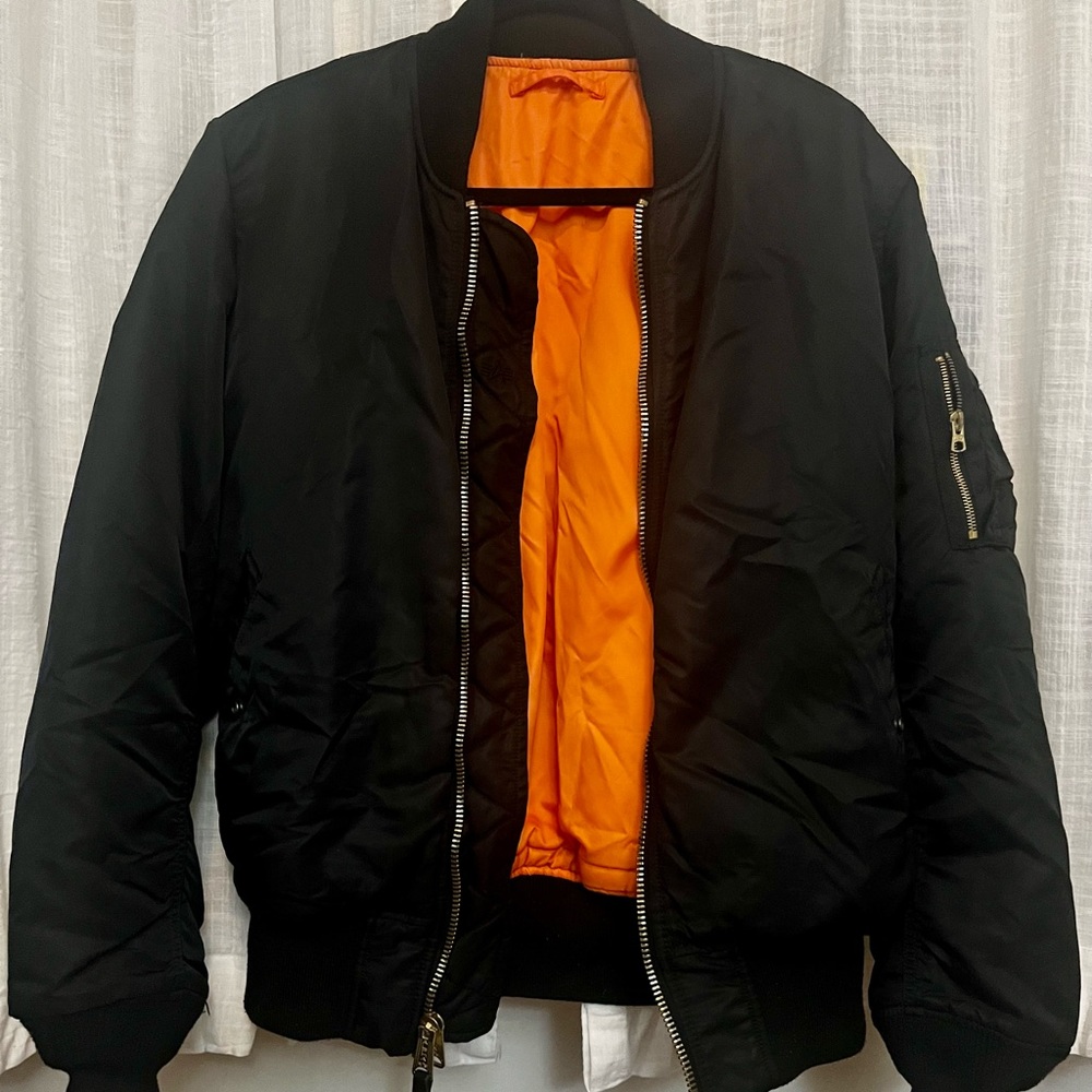 Reversible Alpha Industries. Similar seen on Kanye West
